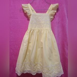 Girl Dres. Soft Yellow. Size 7/8